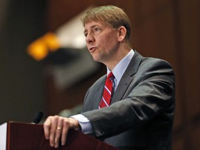 FILE - In this March 26, 2015, file photo, Consumer Financial Protection Bureau Director Richard Cordray speaks during a panel discussion in Richmond, Va. Cordray, the first director of the Consumer Financial Protection Bureau, tendered his resignation Friday, Nov. 24, 2017, and simultaneously named his own successor, setting up the consumer agency for another battle with the Trump White House over control of the powerful federal watchdog. (AP Photo/Steve Helber, File)