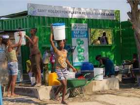 One of The Plastic Bank's 40 Ramase Lajan (picking up money) collection stations in Haiti, where independent collectors exchange plastic for currency.