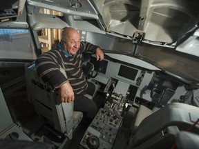 Former pilot Walt Lazaruk in the cockpit of a Boeing 737-200 that he converted to a flight simulator, in Richmond on Nov. 16. Lazaruk bought the cockpit from a California aircraft boneyard in 2003 and rebuilt it as a simulator. He'd now like to sell it.