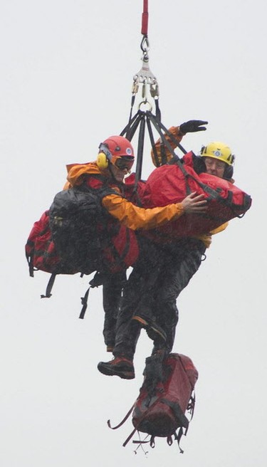 Annette Poitras and three dogs were long-line rescued by helicopter and brought to safety after spending three days lost in the Westwood Plateau area of Coquitlam.