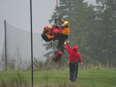 Annette Poitras and three dogs were long-line rescued by helicopter and brought to safety after spending three days lost in the Westwood Plateau area of Coquitlam.