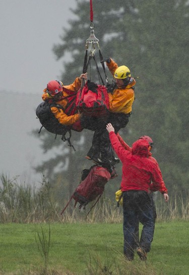 Annette Poitras and three dogs were long-line rescued by helicopter and brought to safety after spending three days lost in the Westwood Plateau area of Coquitlam.