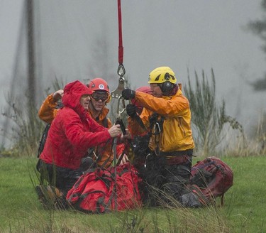 Annette Poitras and three dogs were long-line rescued by helicopter and brought to safety after spending three days lost in the Westwood Plateau area of Coquitlam.