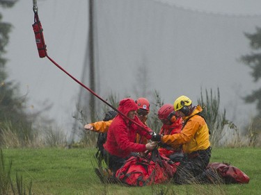 Annette Poitras and three dogs were long-line rescued by helicopter and brought to safety after spending three days lost in the Westwood Plateau area of Coquitlam.