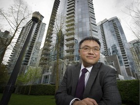 FILE PHOTO - Simon Fraser University City Program director Andy Yan is shown in Coal Harbour, where he has documented significant numbers of vacant condo units.