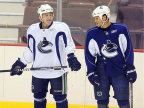 Kevin Bieksa shared a touching message from a fan about mental health on Sunday. Bieksa's former teammate Rick Rypien committed suicide in 2011, prompting Bieksa to launch mindcheck.ca to raise mental health awareness. Bieksa and Rypien are pictured together during a practice in this 2010 file photo.