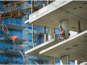 FILE PHOTO : Buildings are under construction around Cambie and SW Marine drive in Vancouver, B.C., October 10, 2017.