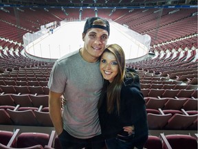 Bo Horvat and his partner Holly Donaldson at Rogers Arena.