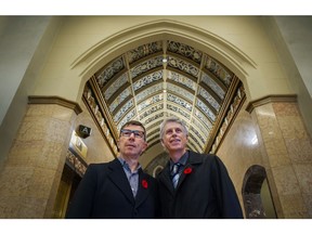 Architects Harry Gugger (left) and Graham Coleman inside the lobby of the restored old building at The Exchange tower in Vancouver.