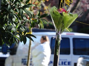 Police investigate at a residence in Vancouver's west side after Barbara Whitlock was killed in 2014.