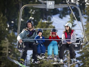 West Vancouver  B.C.  February 13, 2017 -- Thousands took to Cypress mountain to celebrate Family Day  in style.  The  near record snow falls and sunshine made the special holiday day all the better. Here on the way up the Easy Rider chairlift.   Mark van Manen PNG Staff  photographer   see Family Day features  /Vancouver Sun/Province  News  Feature stories  and Web.  00047853A   [PNG Merlin Archive]

see  Family Day  Vancouver Sun/Province/ News stories  and Web.
Mark van Manen, PNG