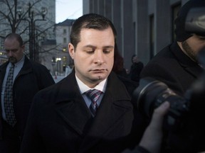 Toronto police officer Const. James Forcillo has been arrested for allegedly breaching his bail conditions related to his house arrest. Forcillo is shown leaving court in Toronto on Monday, Jan. 25, 2016.