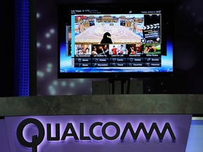 Qualcomm shares spiked Friday in their biggest intraday gain in almost 10 years on talk of a takeover.