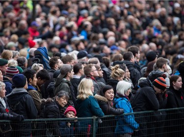 A large crowd listens during a Remembrance Day ceremony in Vancouver, B.C., on Saturday November 11, 2017.