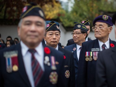 Veterans wait to march during a Remembrance Day ceremony honouring the sacrifices of the early Chinese pioneers and Chinese-Canadian military veterans, in Chinatown in Vancouver, B.C., on Saturday November 11, 2017.