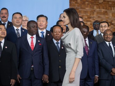 HCR Special Envoy Angelina Jolie walks past delegates to join them for the family photo at the 2017 United Nations Peacekeeping Defence Ministerial conference in Vancouver, B.C., on Wednesday November 15, 2017.