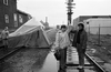 Jean Amos (left) and Carolyn Jerome (right) raise their arms in defiance as members of the Militant Mothers of Ray-Mur, who blocked railway tracks in Strathcona in the early 1970s to protest dangerous conditions for poor children. An unidentified girl stands by a tent erected on the tracks. Shane Simpson, who also lived in the Ray-Mur housing project during the protests, says his politics was inspired by the Militant Mothers. Today, he is a B.C. cabinet minister in charge of reducing poverty.