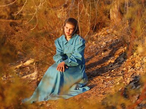 In this Wednesday, Oct. 25, 2017 photo, Shirlonna Barlow poses for a photo in Colorado City, Ariz. The community on the Utah-Arizona border has been home for more than a century to members of the Fundamentalist Church of Jesus Christ of Latter-Day Saints, a polygamous sect that is an offshoot of mainstream Mormonism. (AP Photo/Rick Bowmer)