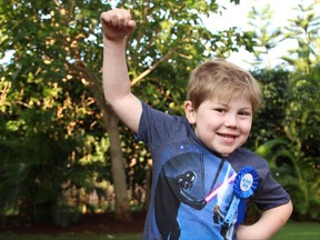 Levi Budd of Victoria is shown in a handout photo provided by his father Lucky Budd. Levi has become a bit of a sensation for coining the word levidrome to define a word that creates another word when written backwards. *