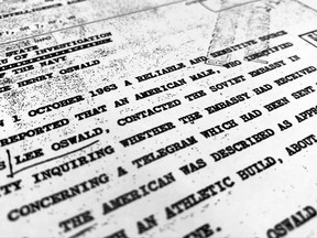 Part of a file from the CIA, dated Oct. 10, 1963, details "a reliable and sensitive source in Mexico" report of Lee Harvey Oswald's contact with the Soviet Union embassy in Mexico City, that was released for the first time on Friday, Nov. 3, 2017, by the National Archives. Documents show U.S. officials scrambling after the assassination of President John F. Kennedy to round up information about Lee Harvey Oswald's trip to Mexico City weeks earlier. (AP Photo/Jon Elswick)