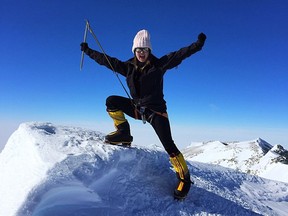 Liz Rose at the top of Mount Vinson in Antarctica in this undated handout photo. From Everest to Denali, a mountaineer from British Columbia has climbed to a record after spending more than two years scaling some of the tallest peaks on Earth.