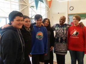 Students from Charles Tupper Secondary's TAP are joined by Tupper vice-principal Jagruti Desai (third from right) and youth and family worker Jennifer Eayrs (second from right).