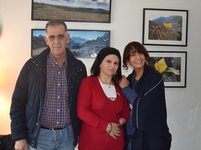 Obeid Abouzeid, his wife Nazadar and interpreter Abeer Al-Kozabary. Abouzeid's family has benefited tremendously from the Adopt-A-School program each week from Lena Shaw Elementary in Whalley.