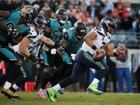 Russell Wilson of the Seattle Seahawks takes off with the football during the first half of last week's game against the Jacksonville Jaguars at EverBank Field in Jacksonville, Fla.