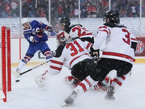 Will Lockwood rings a first period shot off the post in the first period of Friday's Canada vs. USA game, played outdoors in Buffalo, N.Y.