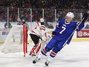 Brady Tkachuk #7 of United States scores a goal against Carter Hart #31 of Canada in the shootout against Canada during the IIHF World Junior Championship at New Era Field on December 29, 2017 in Buffalo, New York. The United States beat Canada 4-3.