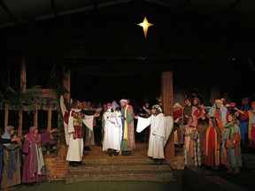 Cast members perform a nativity play.