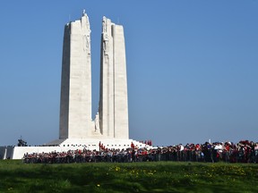 A Vimy Ridge 100th anniversary photo shows the front line of the crowd near the memorial.