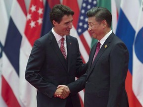 Canadian Prime Minister Justin Trudeau is greeted by Chinese President Xi Jinping during the official welcome at the G20 Leaders Summit in Hangzhou, Sunday, September 4, 2016.