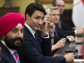 Prime Minister Justin Trudeau and Navdeep Singh Bains, the minister of Innovation, Science and Economic Development, meet with Chinese President Xi Jinping at the Diaoyutai State Guesthouse in Beijing, China on Tuesday, Dec. 5, 2017.