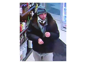 Police in southwestern Ontario say a toddler has been found safe after a car was stolen with the child still in it on Christmas Day. Ontario Provincial Police are asking the public to send any information about the suspect, seen here in a recent handout image from a surveillance camera.