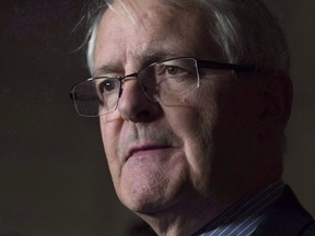 Transport Minister Marc Garneau speaks with reporters in the Foyer of the House of Commons, in Ottawa on Thursday, November 30, 2017.