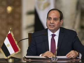 FILE - In this Dec. 11, 2017, file photo, Egyptian President Abdel-Fattah el-Sissi, speaks during a news conference in Cairo, Egypt. Supporters of Egypt's president announced on Sunday, Dec. 24, that they have collected more than 12 million signatures from people urging him to run for a second four-year term, a mostly symbolic gesture as there is little doubt he will contest, and win, next year's elections.