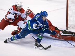Bo Horvat tries to score against the Carolina Hurricanes on Tuesday. He later suffered an undisclosed leg injury in a collision near the boards.