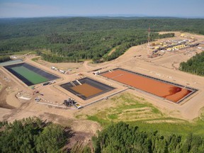 A hydraulic fracturing, or fracking, site is seen from the air near Fort St. John in 2013.