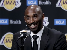 Former Los Angeles Laker Kobe Bryant talks during a news conference before an NBA basketball game between the Los Angeles Lakers and the Golden State Warriors in Los Angeles, Monday, Dec. 18, 2017. Bryant will get his jersey retired during the halftime show.