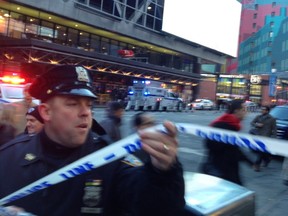 Police respond to a report of an explosion near Times Square on Monday, Dec. 11, 2017, in New York.