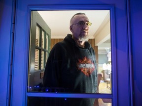 Peter Dawe, 50, poses for a photograph at his parent's home where he lives in Powell River, B.C., on Tuesday December 19, 2017. His father, Frederick, 82, remembers the night his son, six-foot-eight and in his 20s at the time, experienced a psychotic break in the emergency room of a Vancouver-area hospital. "He just lost it. He picked up a couch, swung it around the room, cleaned the room out," Dawe said. He is among those speaking out against demands that the B.C. government tighten the requirements in the province's Mental Health Act to detain someone against their will for treatment.