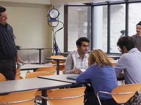 This image released by Lionsgate shows director Michael Showalter on the set with actors Kumail Nanjiani, seated from left, Holly Hunter and Ray Romano during the filming of the 9/11 scene for "The Big Sick."