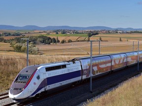 A TGV high speed train passes on the East-European LGV line during a test on September 28, 2016 in Gougenheim, eastern France. 106 kms of new track have been laid between Baudrecourt (Moselle) and Vendenheim (Bas-Rhin) for high-speed transit that will save another 30 minutes off of the 2 hours and 20 minutes trip between Paris and Strasbourg.