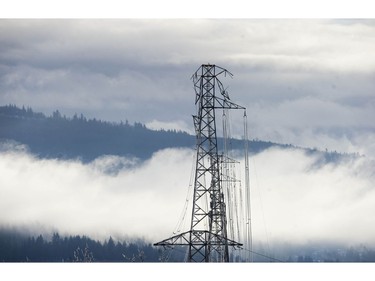 Several arms from this power pylon have toppled due to ice buildup, in Mission, BC Saturday, December 30, 2017. Freezing rain for the past several days caused tree branches to fall on powerlines causing power outages, and trees to topple in Mission, BC, Saturday, December 30, 2017. Thousands of people are without power in the Mission, Abbotsford and Langley areas and the freezing rain has made traveling treacherous.