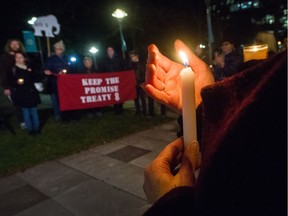 People protest Site C in front of BC Hydro in downtown Vancouver, BC, December 11, 2017. Local grassroots group FightC invited supporters to join a vigil at the BC Hydro offices in Vancouver in response to Site C decision.