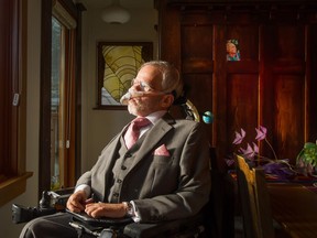 Tim Louis in his Kits home, with a small portrait of his mentor Harry Rankin in the background.