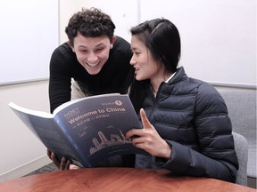 Language students Evan Chiles and Emily Nguyen learn Mandarin at the NOET office, in Vancouver, BC., December 19, 2017.