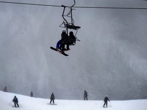 Skiers enjoy the fresh snow during a weather warning on Cypress Mountain in West Vancouver.