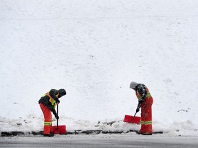 Winter storm conditions continue throughout the Fraser Valley, with freezing rain expected in Abbotsford throughout Thursday. Snow has been a regular sight throughout the Metro Vancouver region this December, as seen in this Dec. 27, 2017 file photo of workers shovelling snow on Burnaby Mountain.